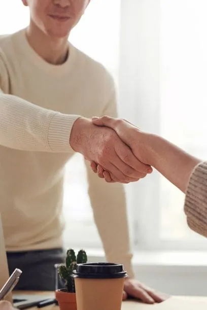 Close-up shot of handshake Close-up shot of handshake